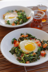 Fried eggs with spinach