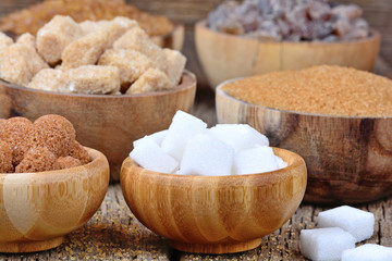 Bowls with various kinds of sugar