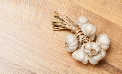 Garlic on wooden background