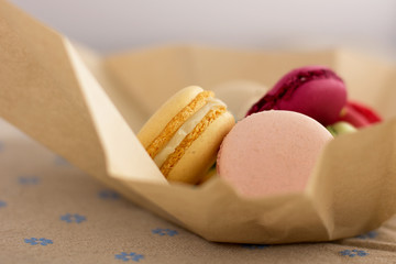 Tasty sweet macarons and cofe. Macaroons on table