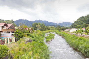Fototapeta na wymiar view from the bridge crossing the small stream to bajo boquete in the province of Chiriqui Panama