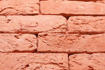 Red fire-bricks lying in a row