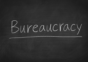 Obraz premium bureaucracy concept word on a blackboard background