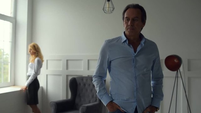 Annoyed man reproaching his wife