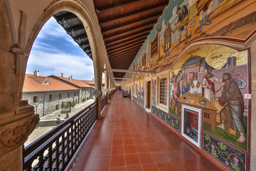 Arcade with religious mosaics in monastery