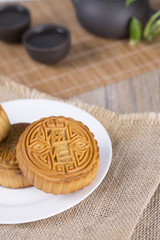 Fototapeta na wymiar Mooncake and tea,Chinese mid autumn festival food. Closeup.