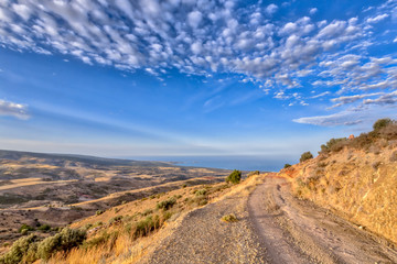 Mountain road with view over sea on Cyprus Island