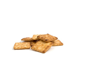 Pile sugar biscuit or crackers on isolated white background