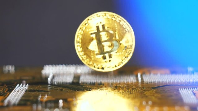 Bitcoin Model Stands on Chip As Worldwide Cryptocurrency