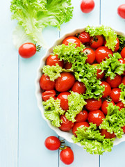 Cherry tomatoes and greens