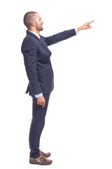 Business man in blue suit pointing with finger, isolated over a white background