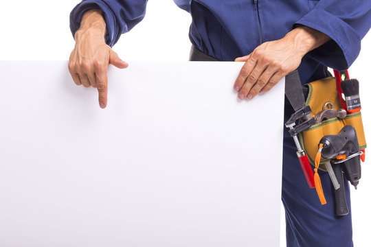 Closeup of a worker pointing to a white board