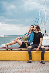 Guy and girl on pier