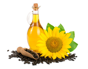 Sunflower oil, seeds and flower isolated on white background