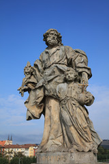 Fototapeta na wymiar Baroque Statue of Saint of Josephus on old Main Bridge in Wurzburg. Franconia. Germany