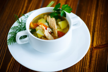 fish soup with vegetables in a plate