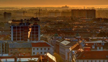 Part of Zagreb roofs with fog in sunrise