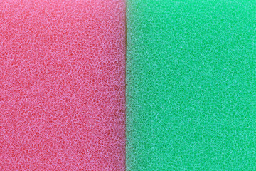 Fototapeta premium Pink and green sponge surface background.