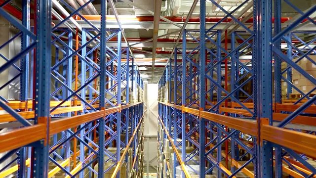 Moving Through High Rack Storage System in Warehouse