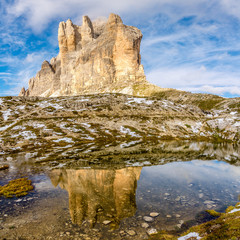 Water reflection of Cima Piccola (Tre Cime di Lavaredo) in Dolomites - South Tirol ,Italy
