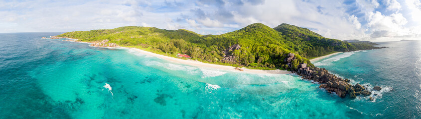 Panoranic aerial view of Grand and Petite Anse in La Digue, Seychelles - obrazy, fototapety, plakaty