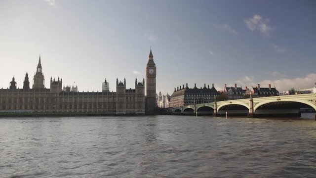 Big Ben Tower and Westminster Bridge at Thames in London