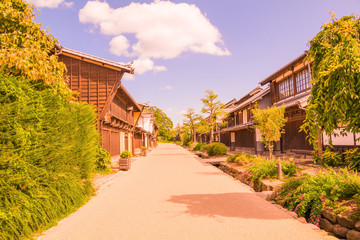 Fototapeta na wymiar A road and The old town of Unno-juku is a post town and dozens of old buildings have been beautifully preserved for the travelers of Hokkoku Road in Tomi-shi, Nagano Prefecture, JAPAN.