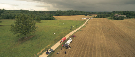 Drone over rural road movie set