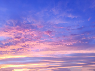 Naklejka na ściany i meble Beautiful sun rays of sunset and with colorful of sky background