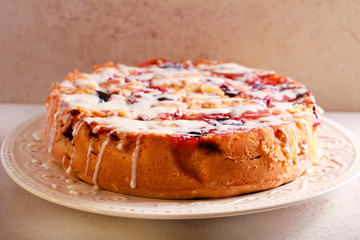 Mixed fruit cake with icing drizzle