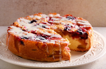 Mixed fruit cake with icing drizzle