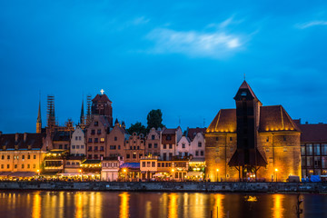 Obraz premium Old town and Motlawa river at night in Gdansk, Pomorze, Poland