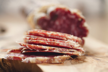 Obraz premium sliced italian salame close up shot