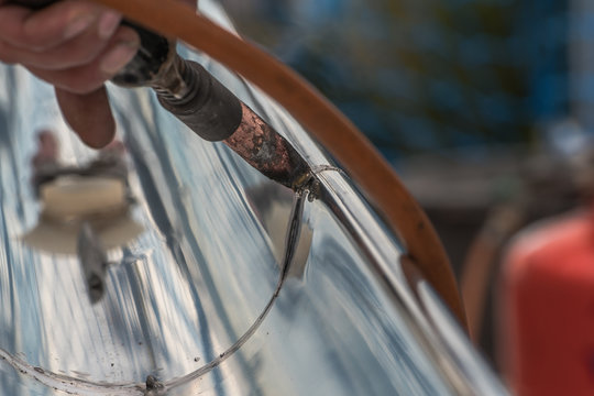 Close-up of a newly installed gutter on a roof. Craftsmanship in tranditional construction.