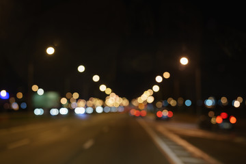 bokeh blur of traffic lights in city at night
