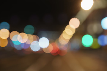 bokeh blur of traffic lights in city at night