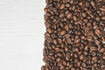 Frame of coffee beans with free space for text, white background top view