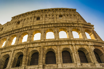 Fototapeta na wymiar Colosseum closeup view, the world known landmark of Rome, Italy.