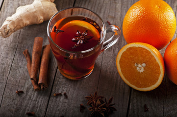 hot tea with spices and oranges