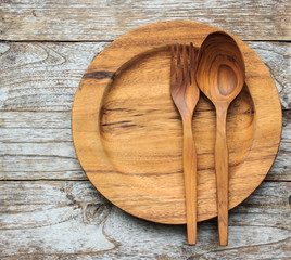 Dish Wooden and cooking utensils on table