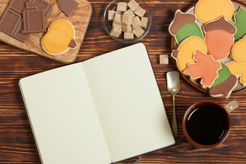 Autumn Style. Homebaked Decorated Sugar Cookies With Royal Icing. Open Notepad. Chocolate.