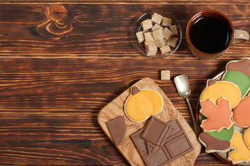 Autumn Style. Homebaked Decorated Sugar Cookies With Royal Icing. Olive Tree Wooden Board. Chocolate.