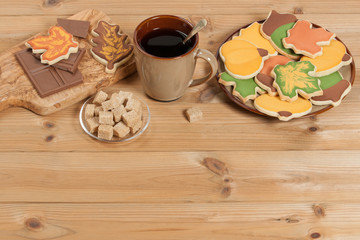 Autumn Style. Homebaked Decorated Sugar Cookies With Royal Icing. Olive Tree Wooden Board. Chocolate.