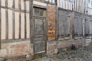 Fototapeta na wymiar Passage with medieval houses downtown in Honfleur, France