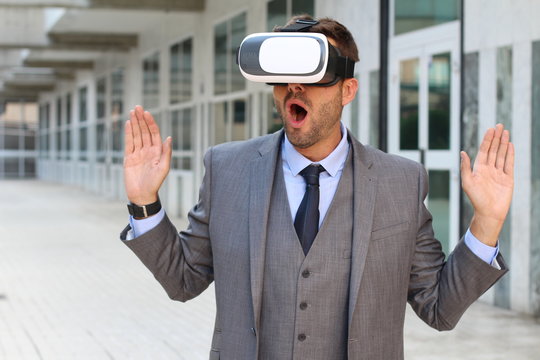 Businessman using virtual reality glasses