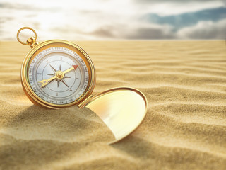 Compass on sea sand. Travel destination and navigation concept. - obrazy, fototapety, plakaty