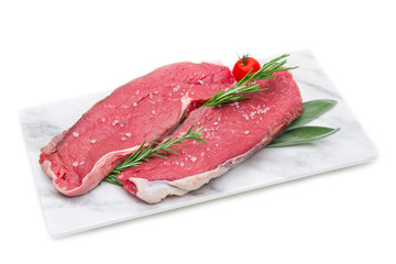 Pieces of raw roast beef meat