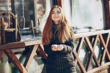 girl walking in a winter city