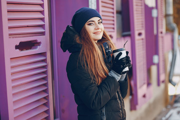 girl walking in a winter city
