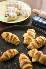 Homemade domestic baked bun rolls on the baking tray